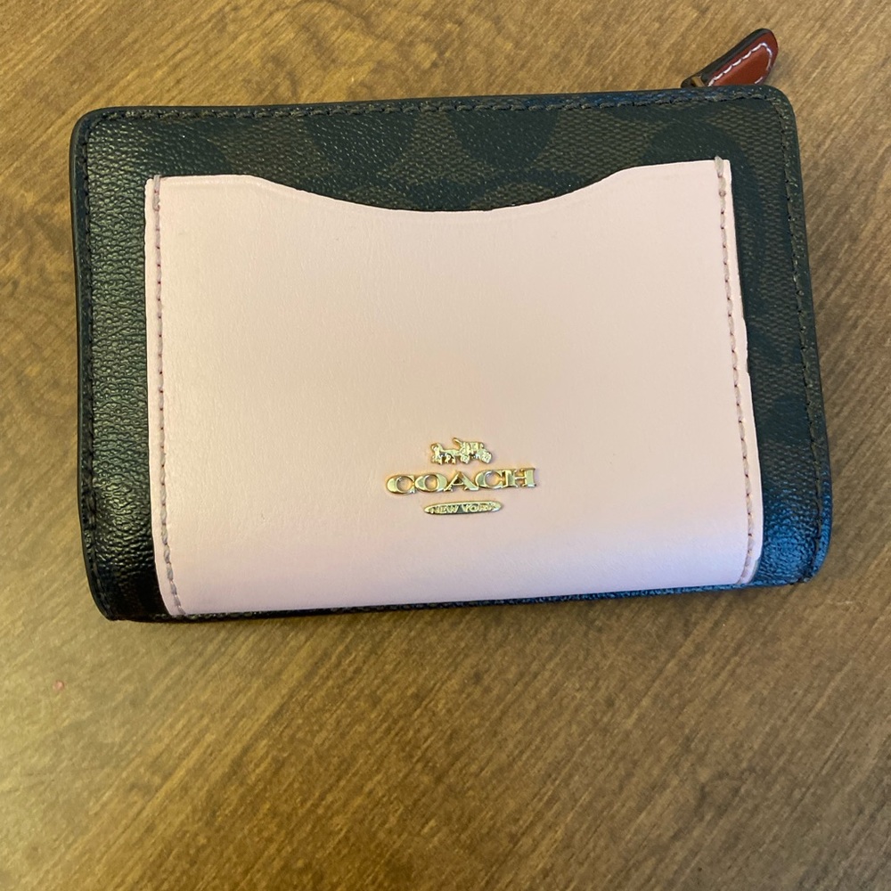 A coach brown and pink wallet